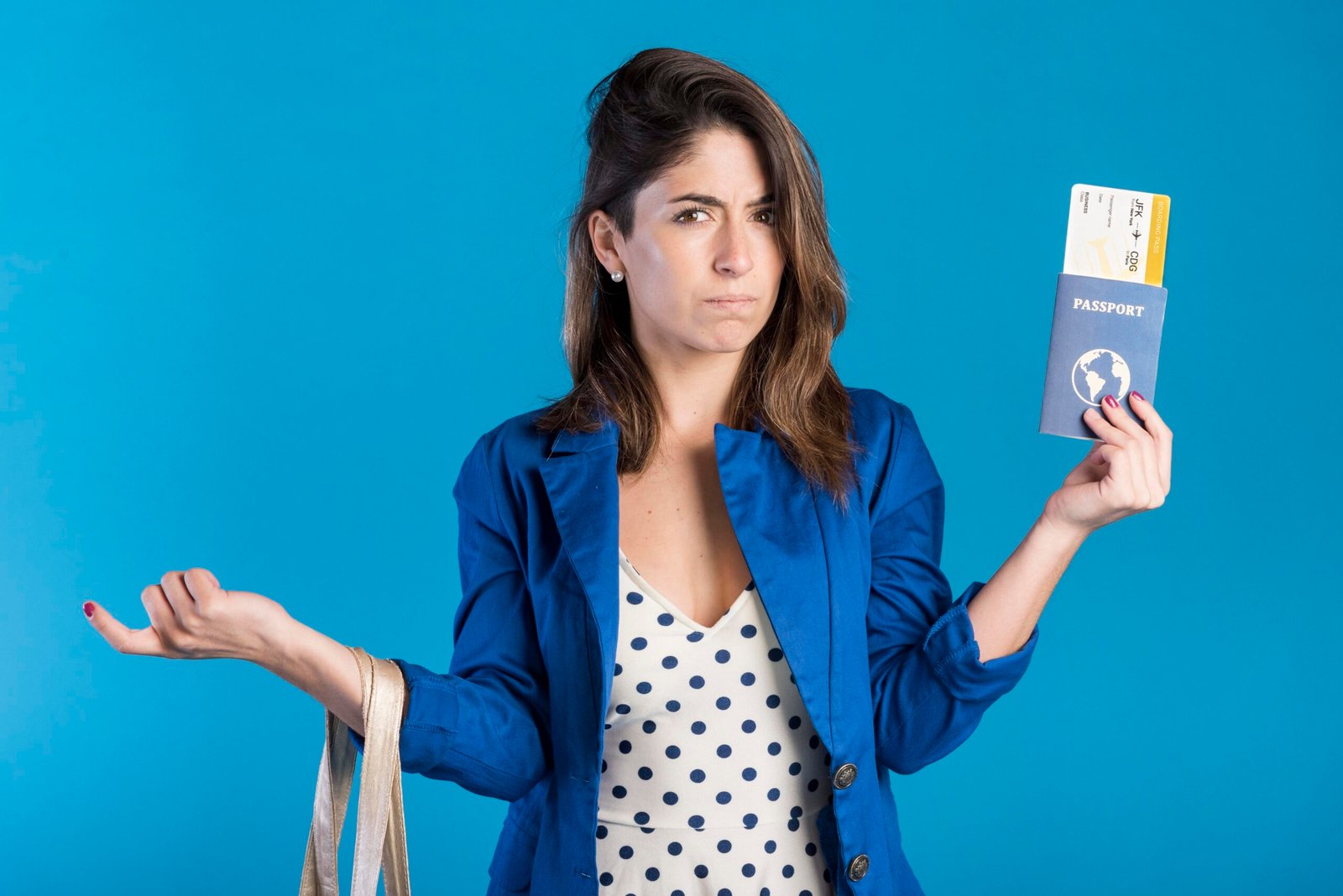Woman Holding Passport With Blue Background